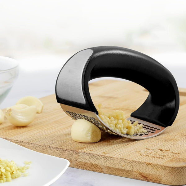 Stainless steel garlic crusher and peeler